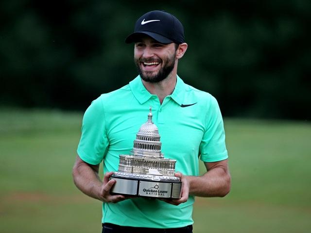 Kyle Stanley with the Quicken Loans National trophy